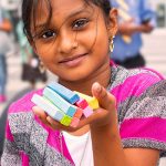 Indian Child with Colored Chalk