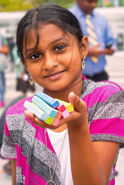 Indian Child with Colored Chalk